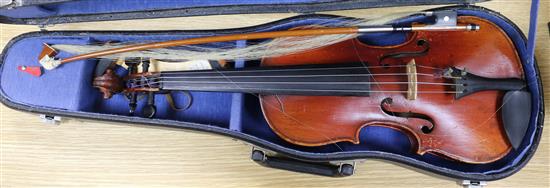 A cased violin length 53cm